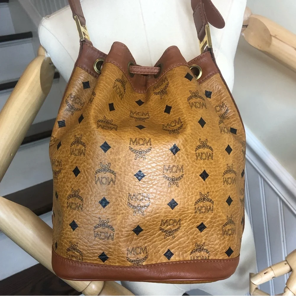 MCM Visetos Cognac Leather Monogram Bucket Drawstring Crossbody Bag EUC